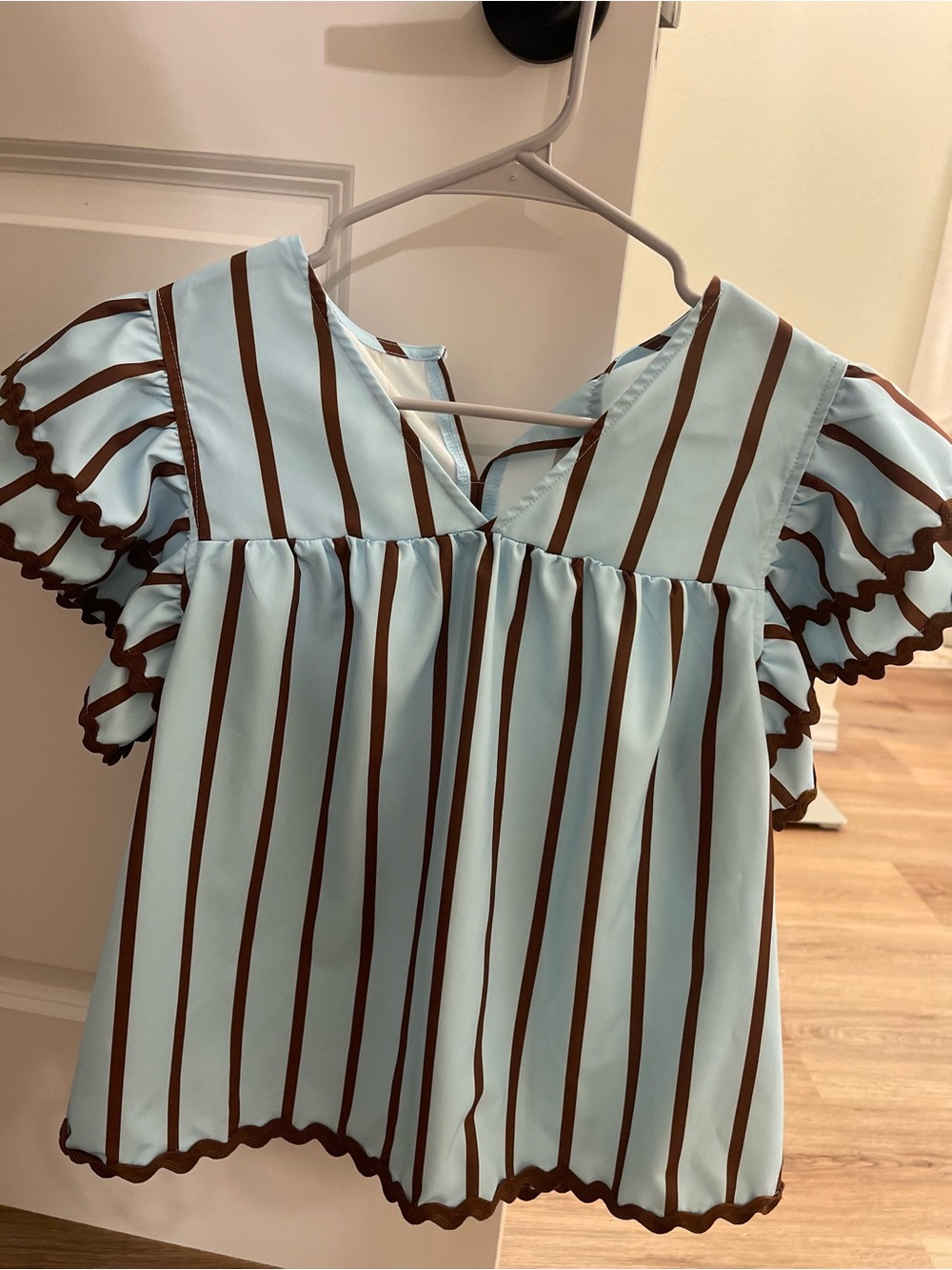 Light Blue Striped Ruffle Sleeve Blouse with Brown Trim